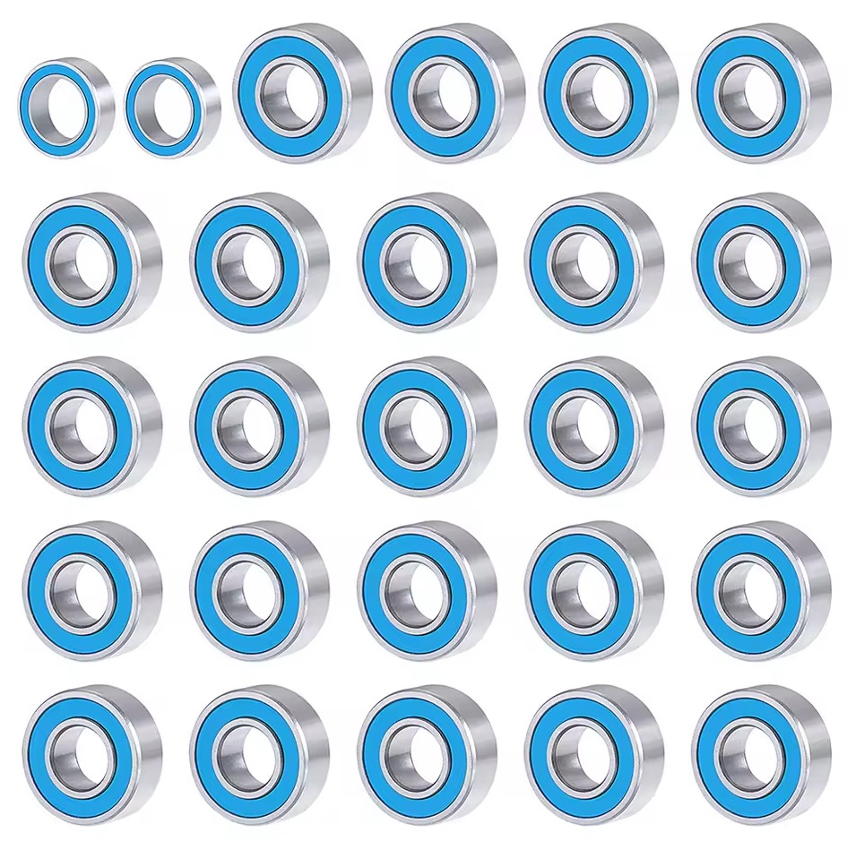 Blue-sealed ball bearings arranged in a 5x5 grid pattern on a white background for industrial use.