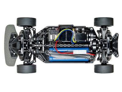 RC car chassis view with motor, battery, and wiring components showing internal structure and design details.