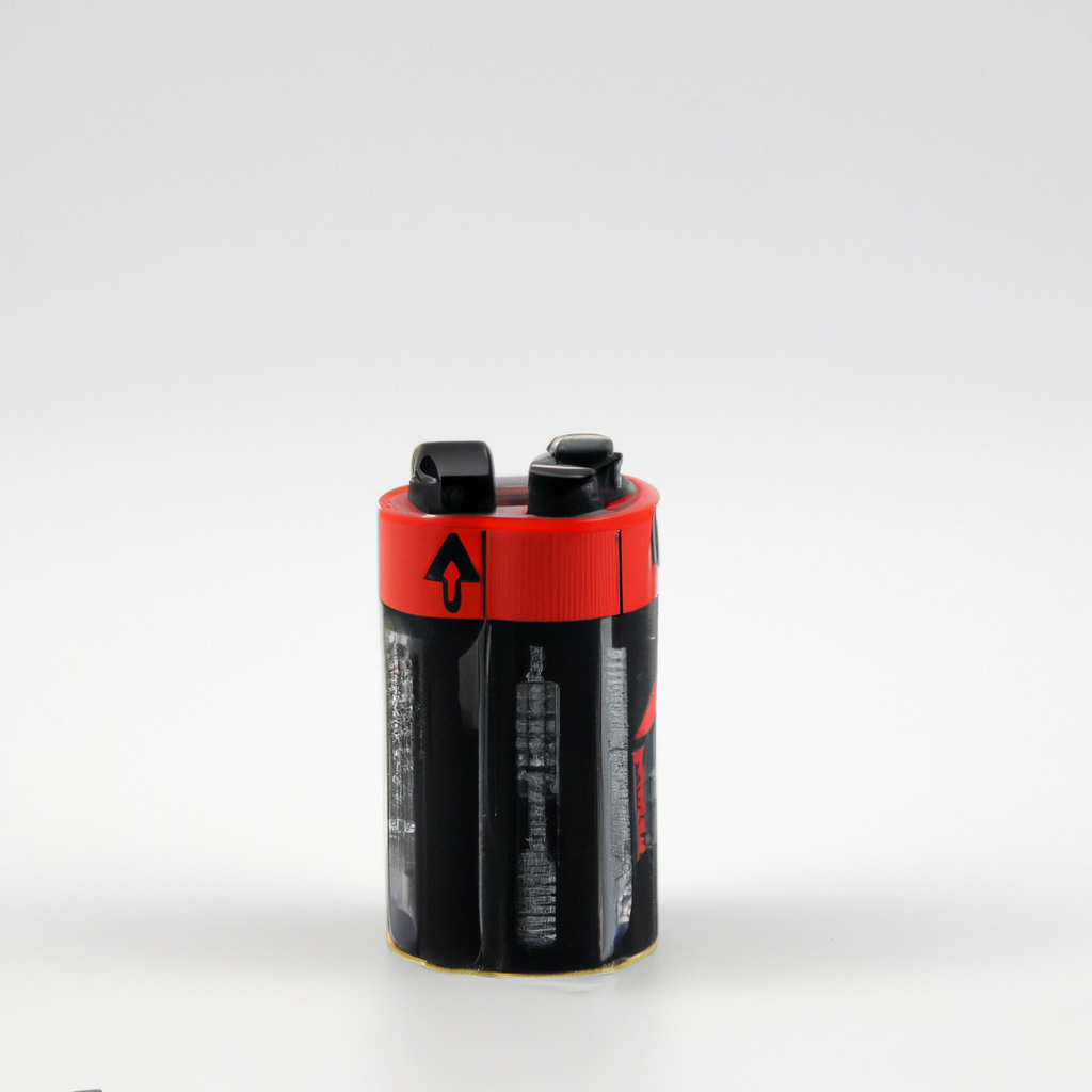 Red-black cylindrical pencil sharpener on a white background.