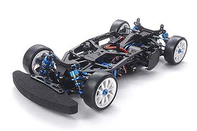 RC car chassis with suspension and wheels, showcasing detailed engineering and design for performance enthusiasts.