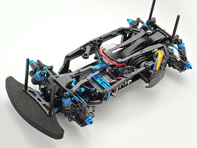 RC car chassis with advanced suspension system, showcasing intricate components and design for performance.